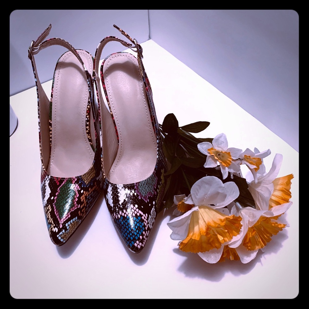 Shoes with snake prints. They are tricolor.